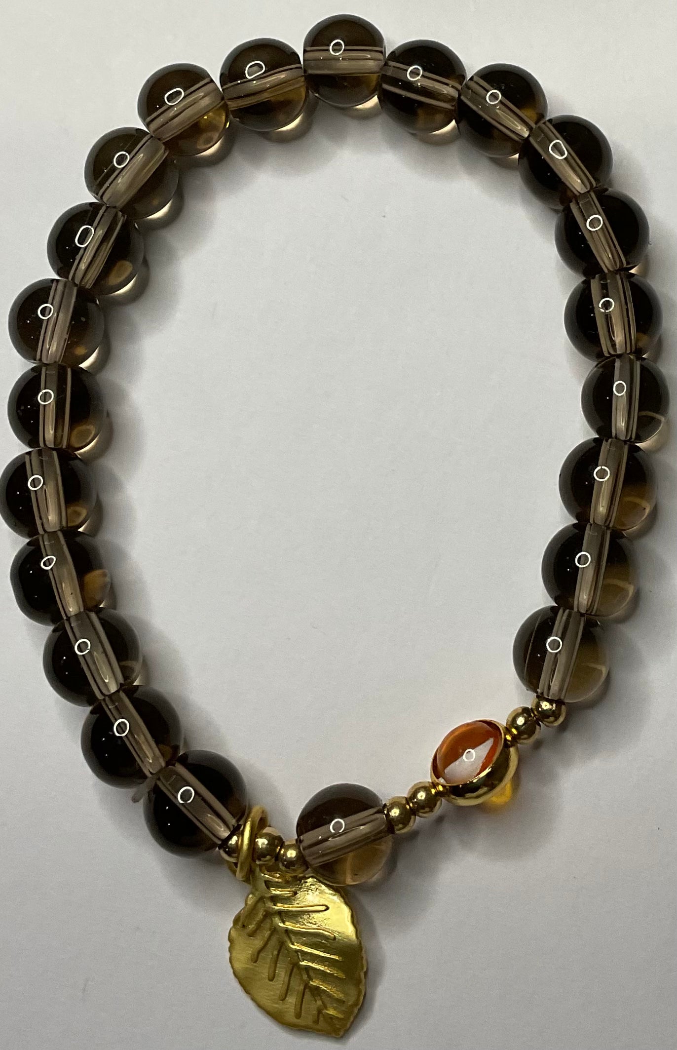 Gold leaf on black beads Bracelet