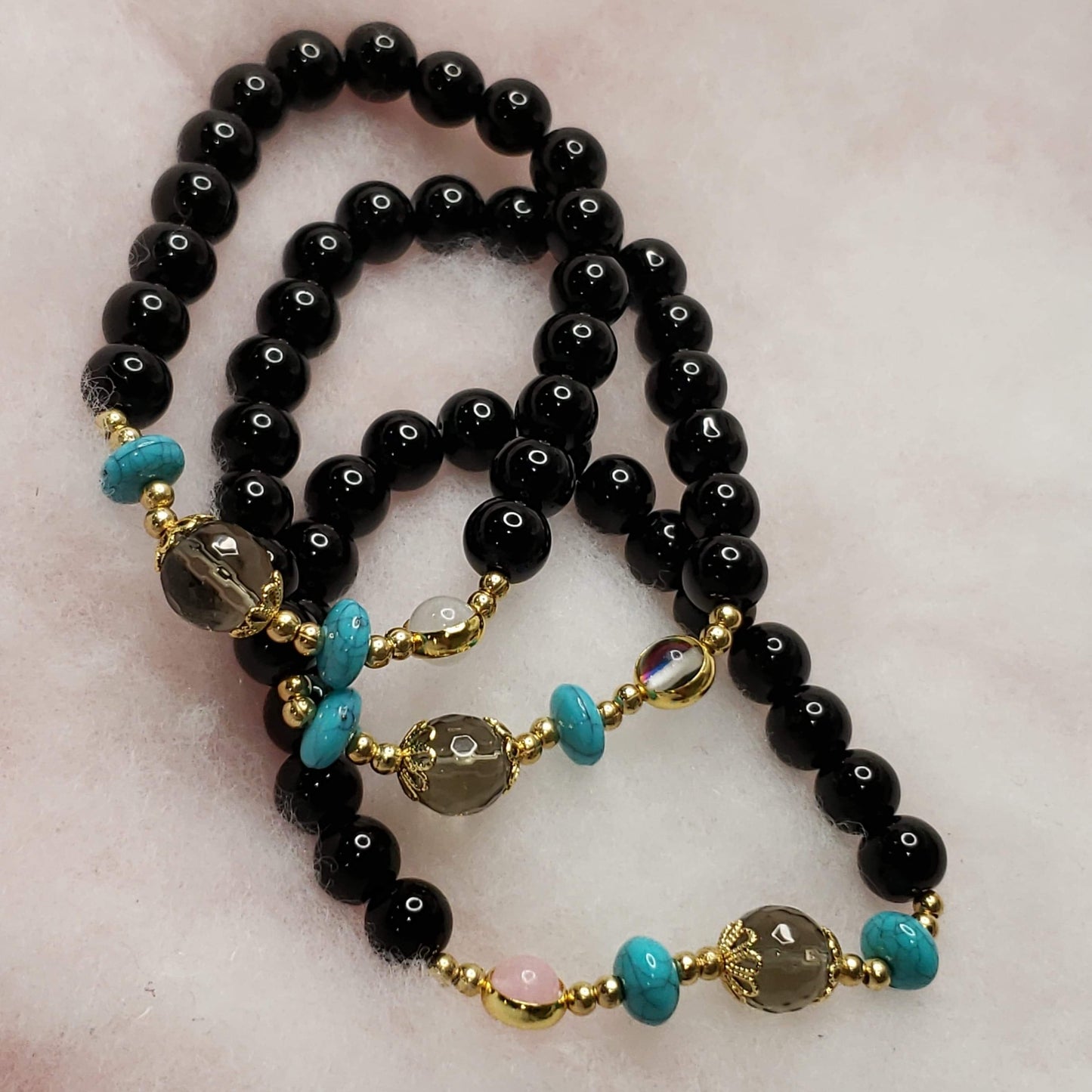 Black beaded bracelet with a touch OG turquoise