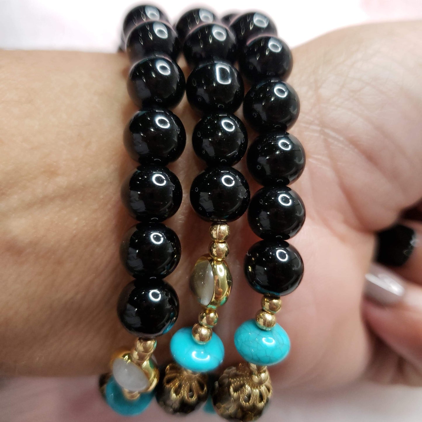 Black beaded bracelet with a touch OG turquoise